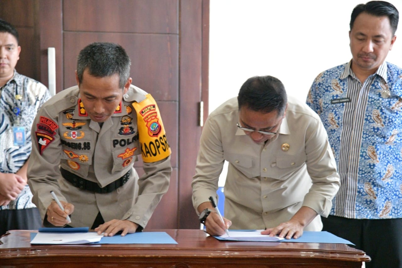 Bupati Sachrul dan Kapolres Boltim Teken NPHD Pengamanan Penyelenggaraan Pilkada 2024