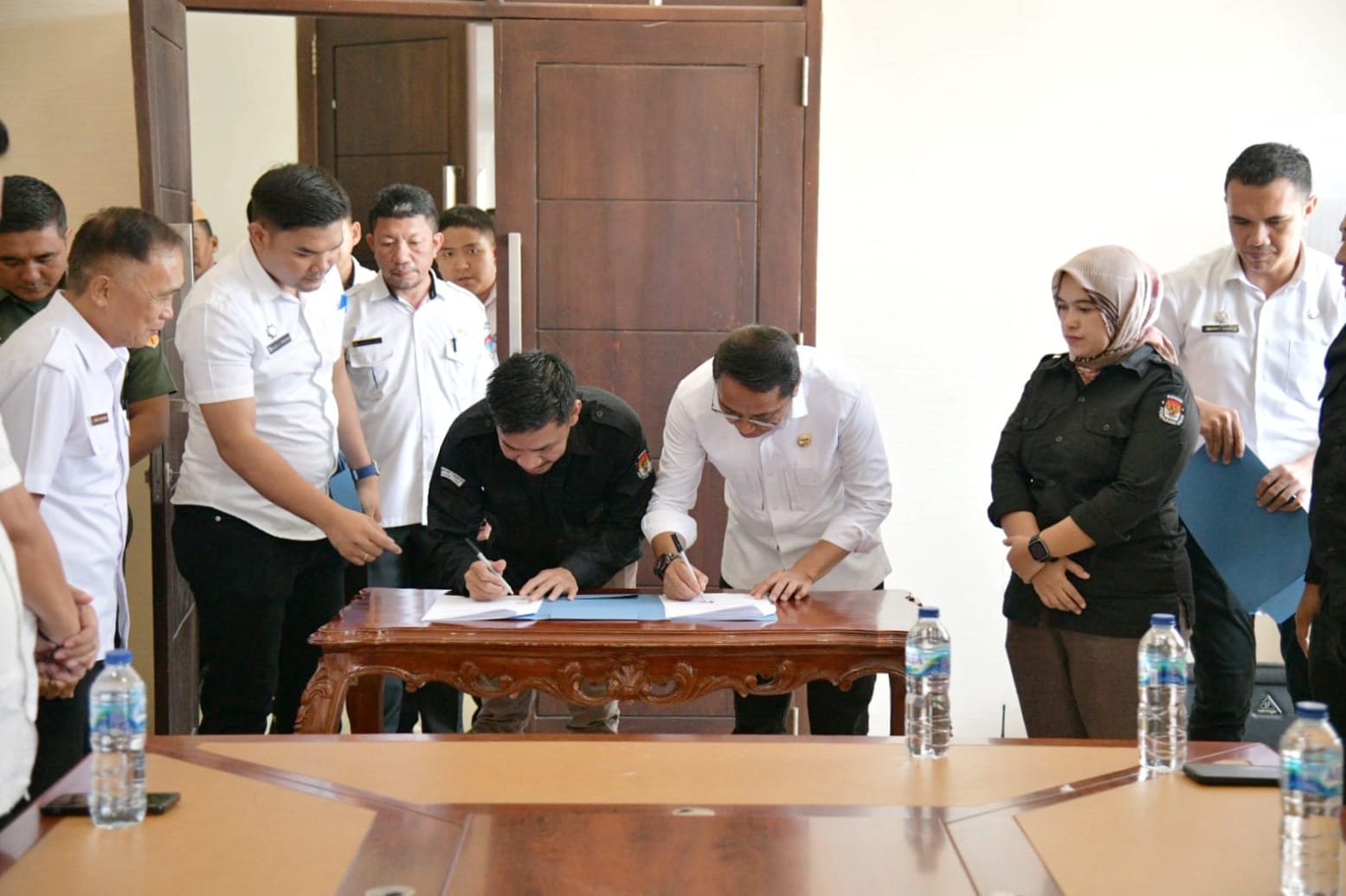 Sukseskan Pilkada 2024, Pemkab Boltim Bersama Penyelenggara Pemilu Teken NPHD